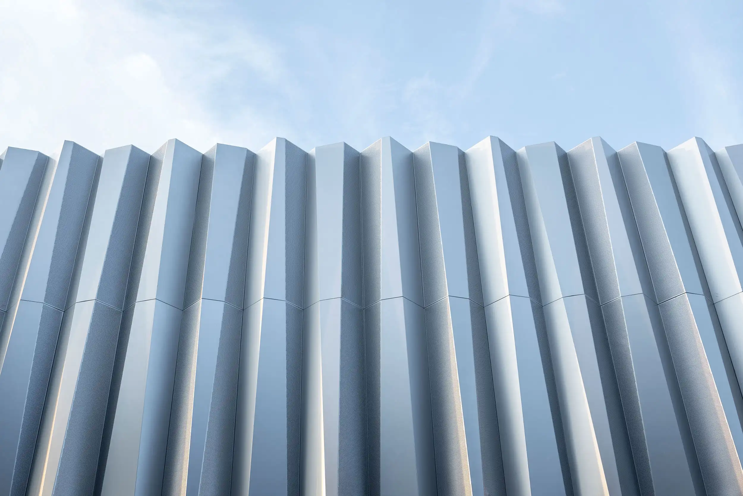 Aluminum exterior wall panels with folded architectural facade design