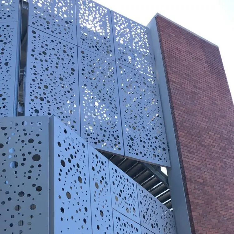 Revolutionize Your Building with Perforated Aluminum Panels: The Ultimate Decorative Solution Custom perforated aluminum screen panels installed on building facade
