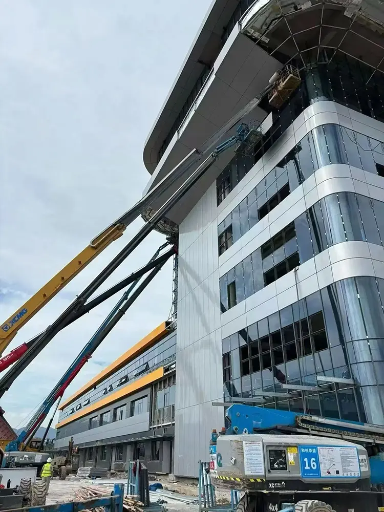Home Likton aluminum facade panel installation on a commercial building site