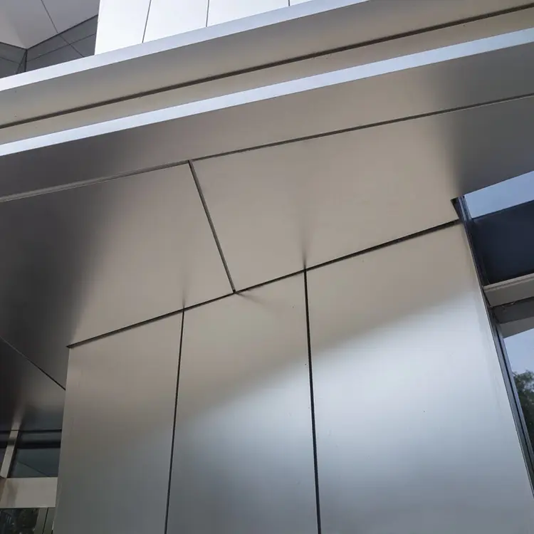 Likton flat aluminum facade panels showing panel joints and surface finish