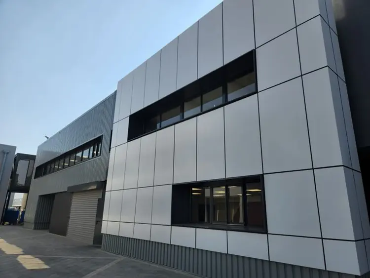 Likton flat aluminum facade panels installed on a standard exterior wall project