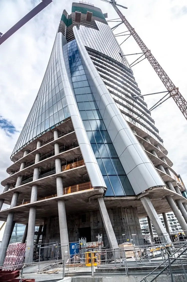 Likton metal facade panels being installed on a high-rise building exterior
