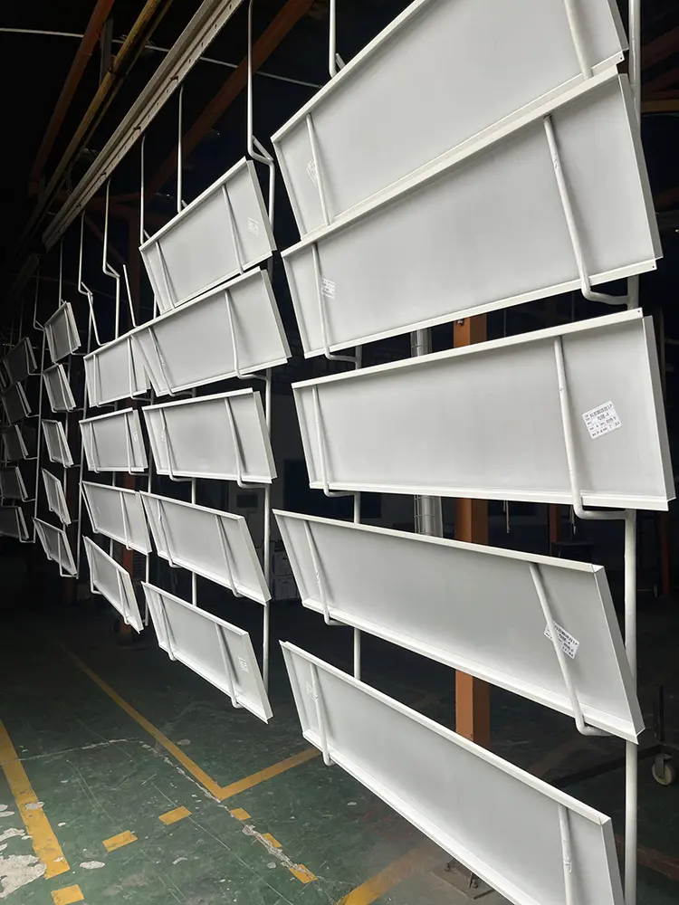 Curved Aluminum Cladding Panels: Radius, Joints and Buying Checks Formed aluminum panel backs with folded returns and reinforcement details in a workshop