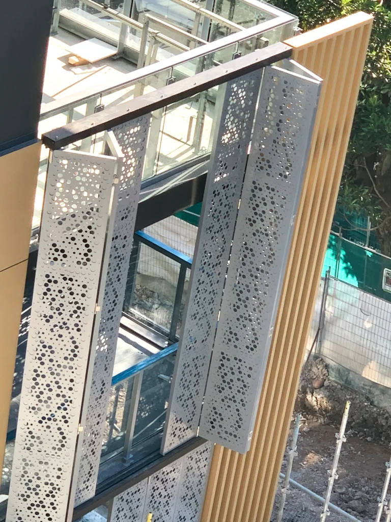 Sliding Perforated Screen for Outdoor Terrace
